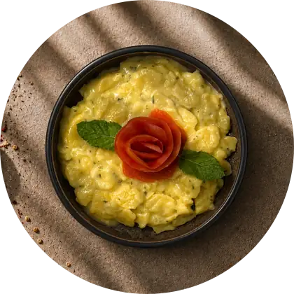 Kartoffelsalat — Kartoffelstücke in sämiger Sauce.